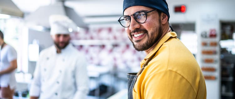 Portrait of a mid adult man at the kitchen