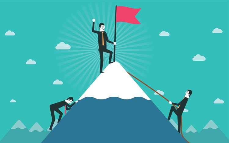Businessman go to the top of mountain.