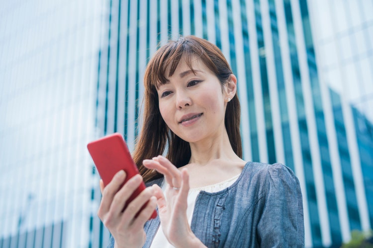 Business woman using a smartphone
