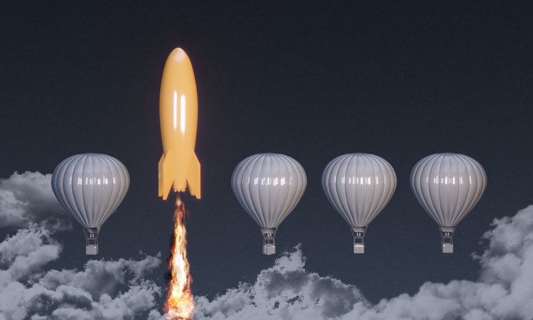 Orange colored rocket rising on the top between the hot air balloons. ( 3d render )