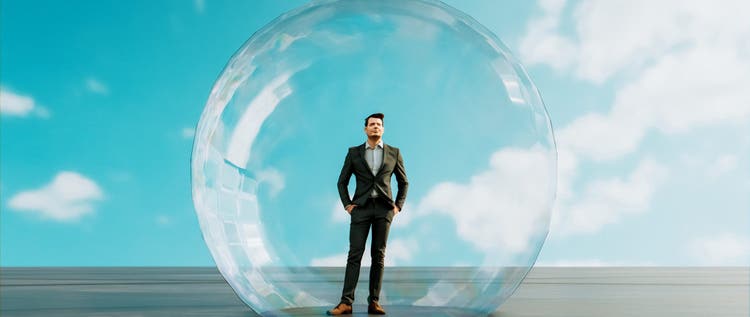 Digitally generated concept image of man inside a big bubble. It could be isolation for health reasons, but it could also be, that the man is inside a financial bubble.