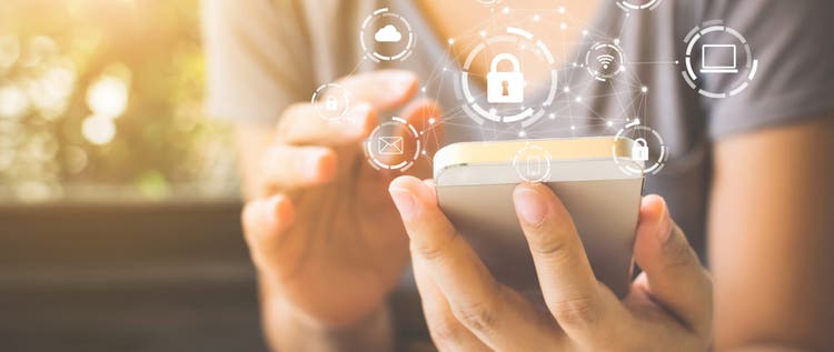 Woman using smartphone with icon graphic cyber security network of connected devices and personal data information