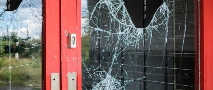 Broken glass in a business door