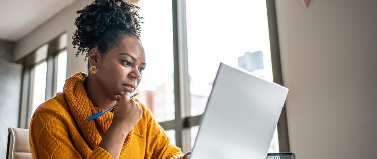 Black woman working from home office
