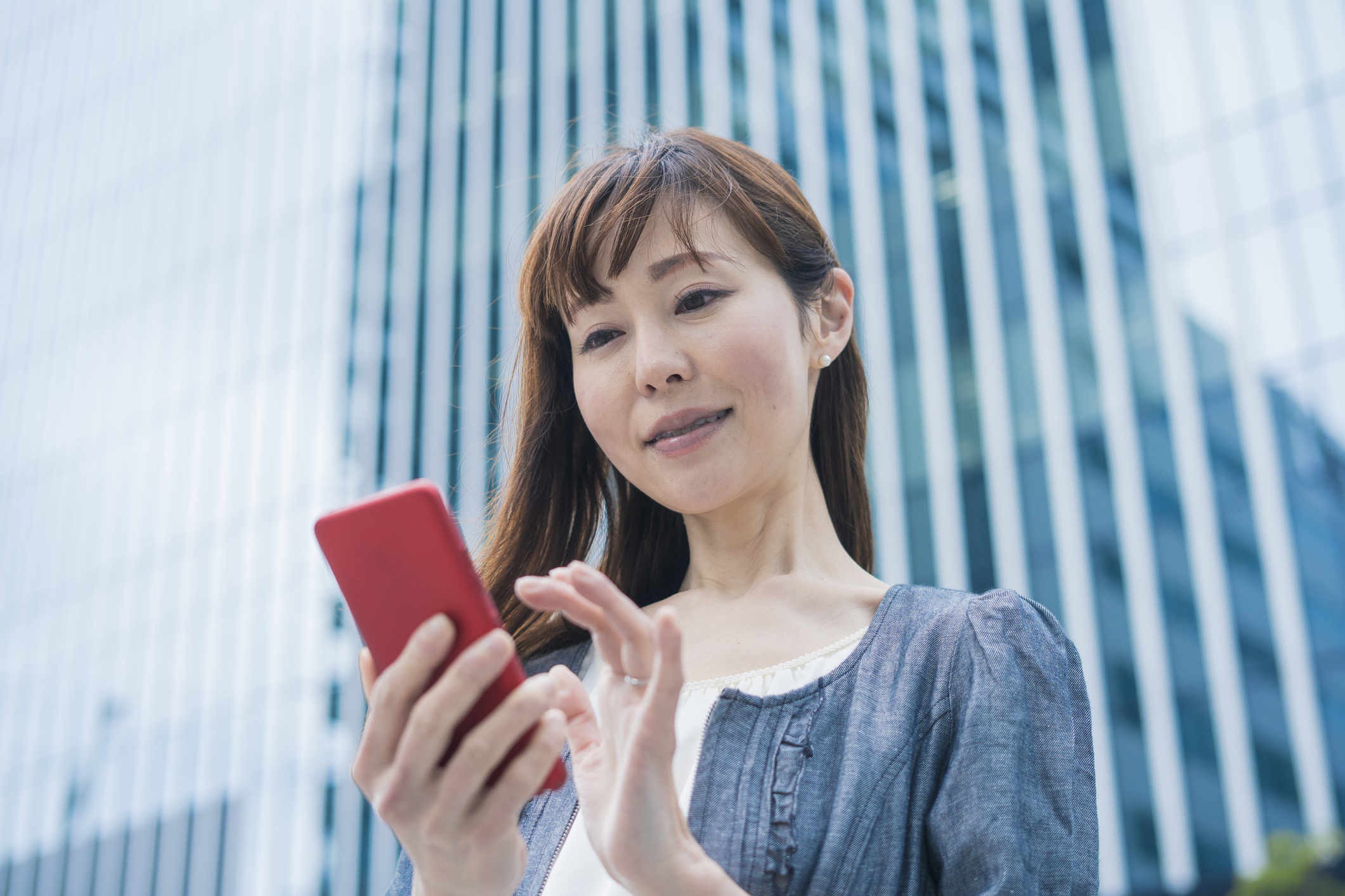 Business woman using a smartphone