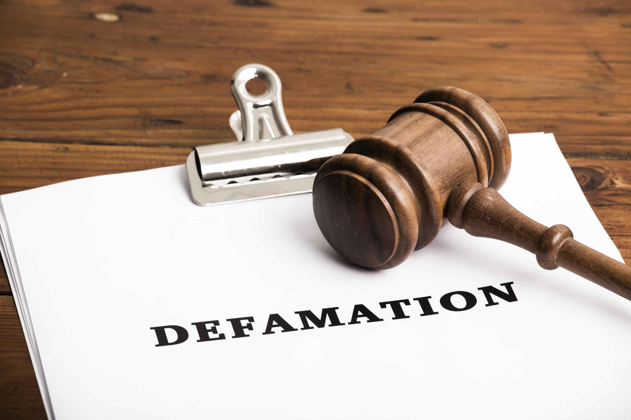 Defamation file in court with gavel