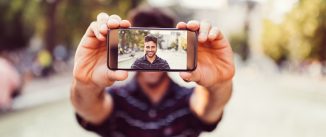 man taking selfie