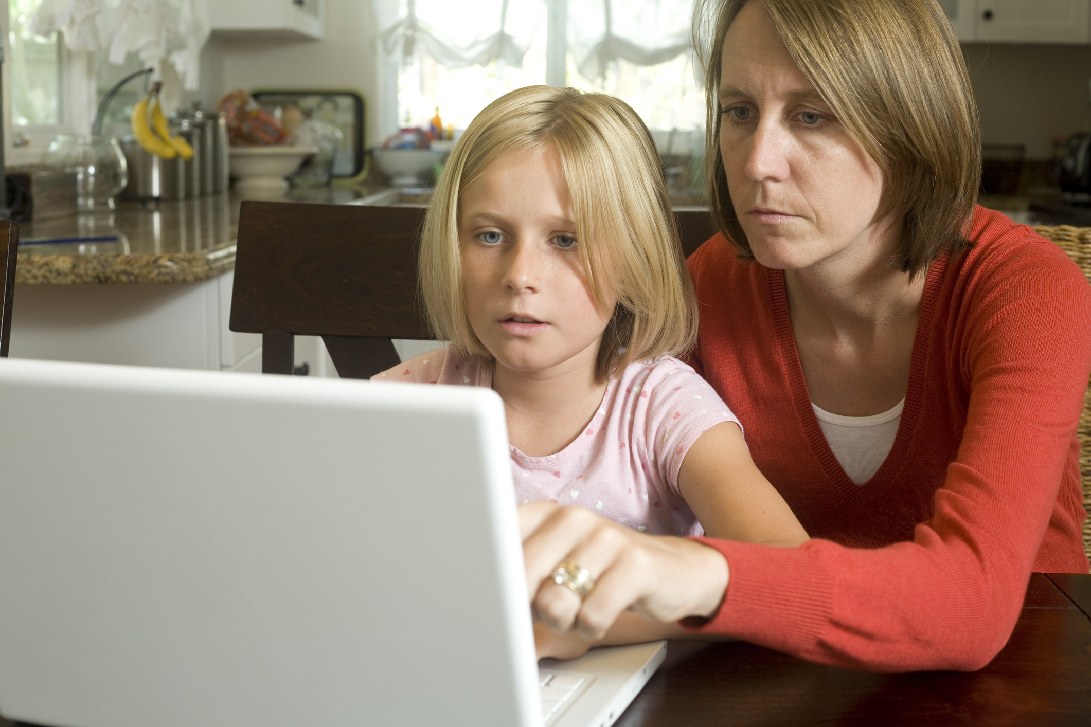 Mom Helps Daughter Do Her Homework