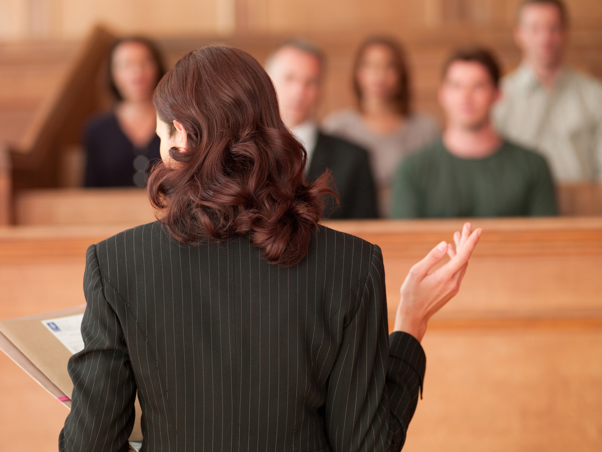 Female lawyer presenting her case to a jury