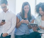 people checking mobile devices