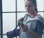 woman checking smartphone