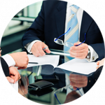 executive holding glasses
