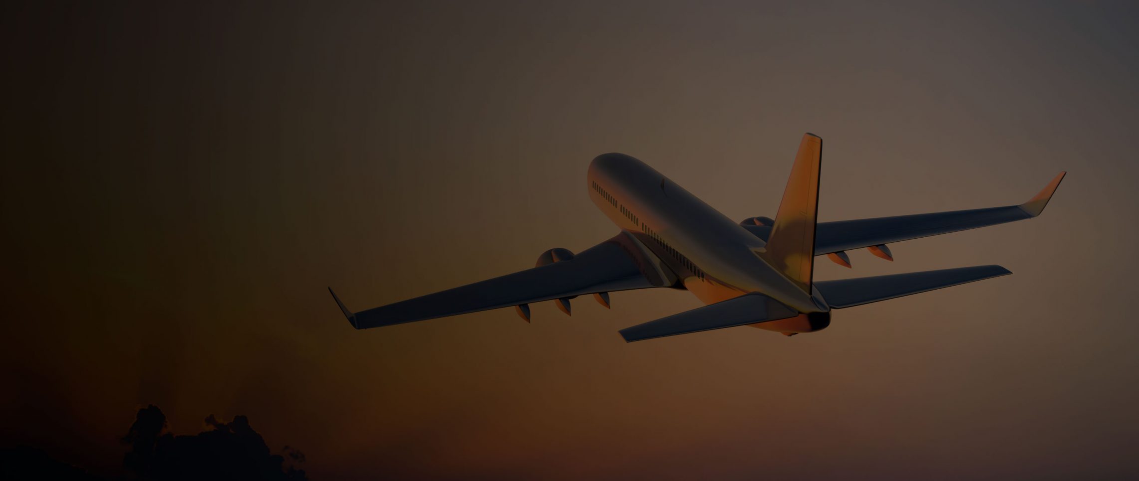 Passanger airplane flying above clouds in evening.