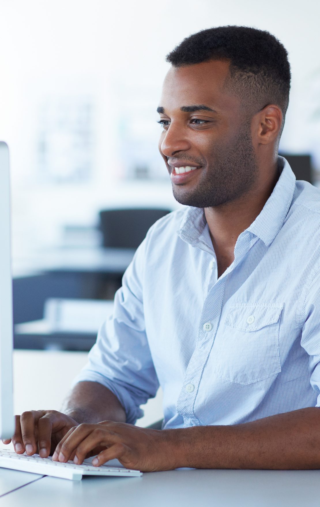 man working at computer