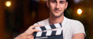 Portrait of a handsome man a ready to film a new scene