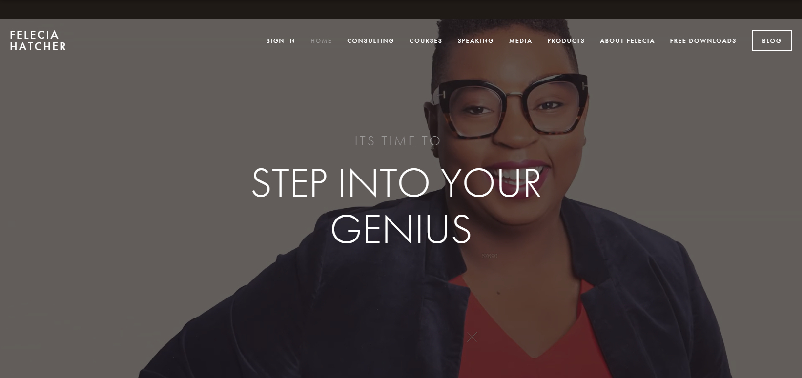 White text saying "Step into your genius" superimposed  over a closeup of a professional woman's head and shoulders.