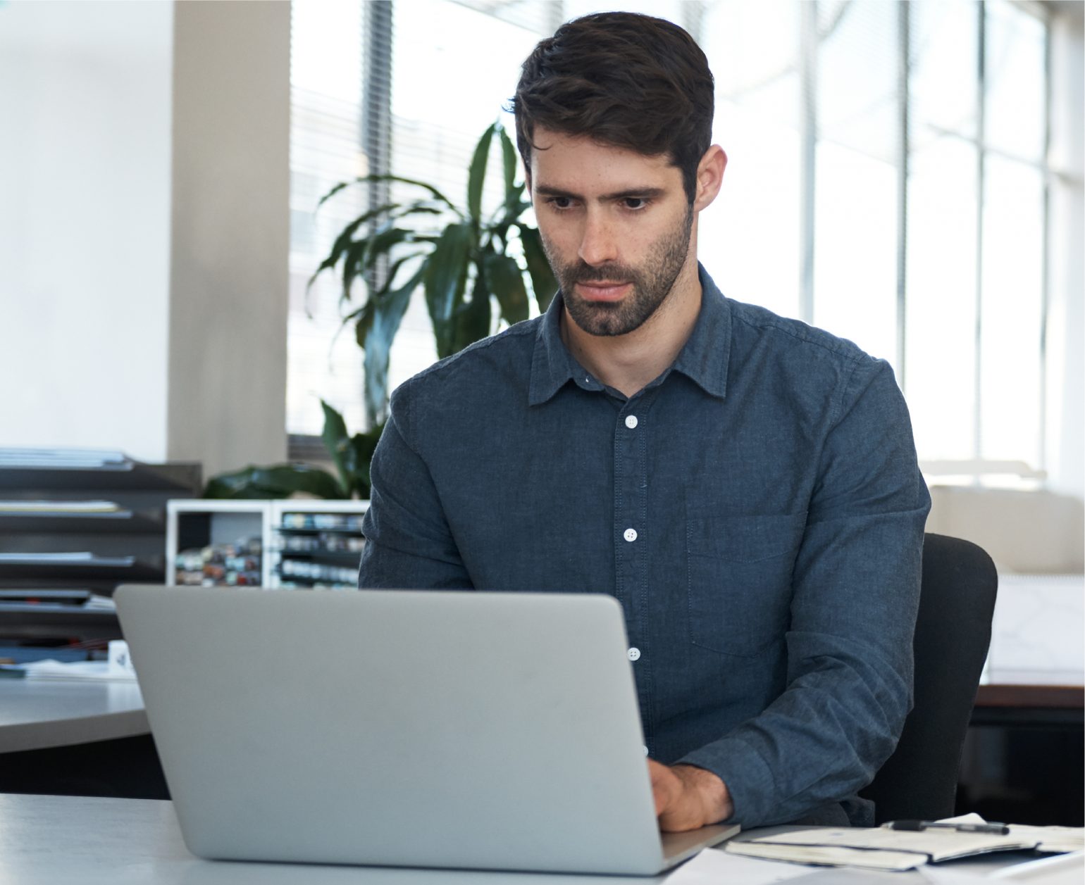 Man searching at laptop